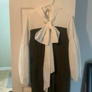 Size medium long sleeve jumper with bowtie in front